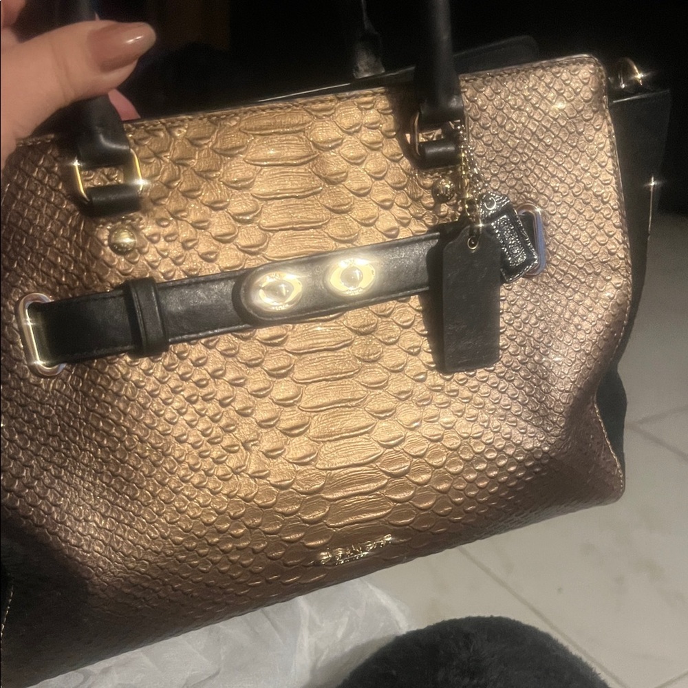 Gold Textured Handbag. Black suede sides. Unique and rare. Omg Listing price 375